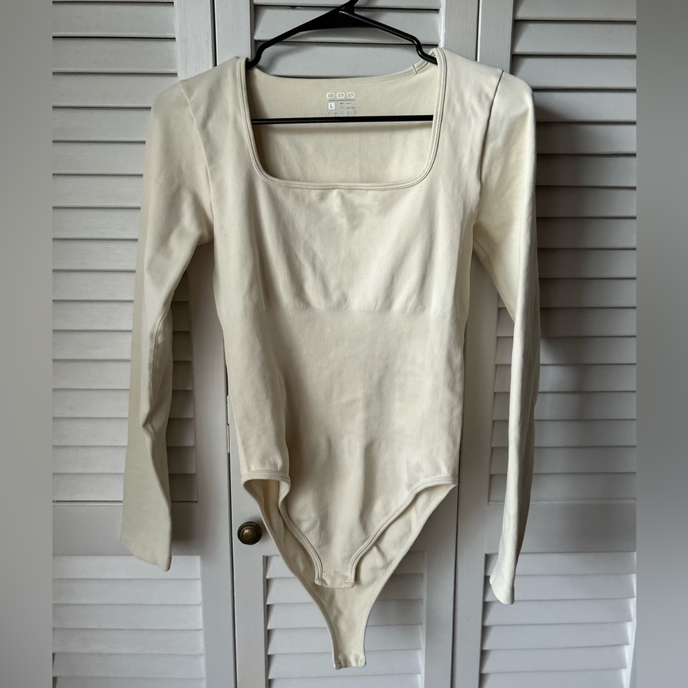 This is a brand new OQQ square neck long sleeve bodysuit.